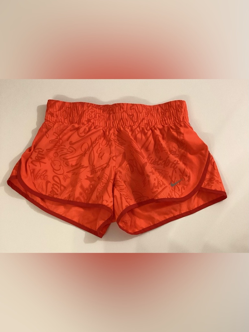 Nike Women’s Bright Orange Athletic Shorts with Script Print